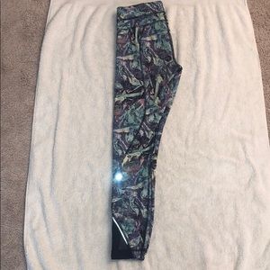 Lulu lemon leggings with mesh cutouts and pockets